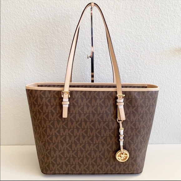 Michael Kors Handbags - NWT Michael Kors Jet Set Travel Top Zip Signature